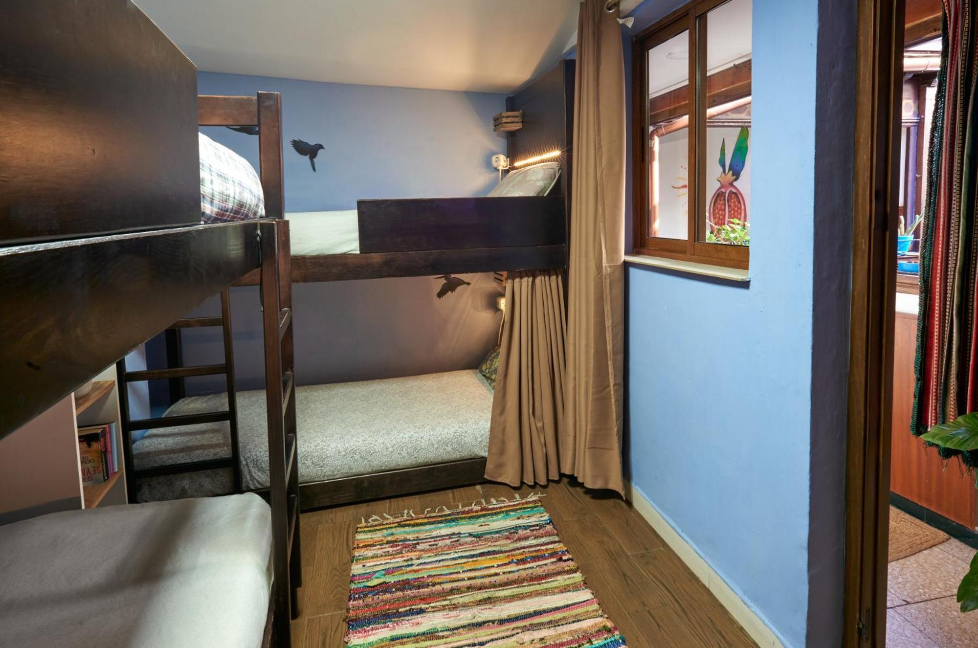 Cama en habitación compartida mixta de 4 camas